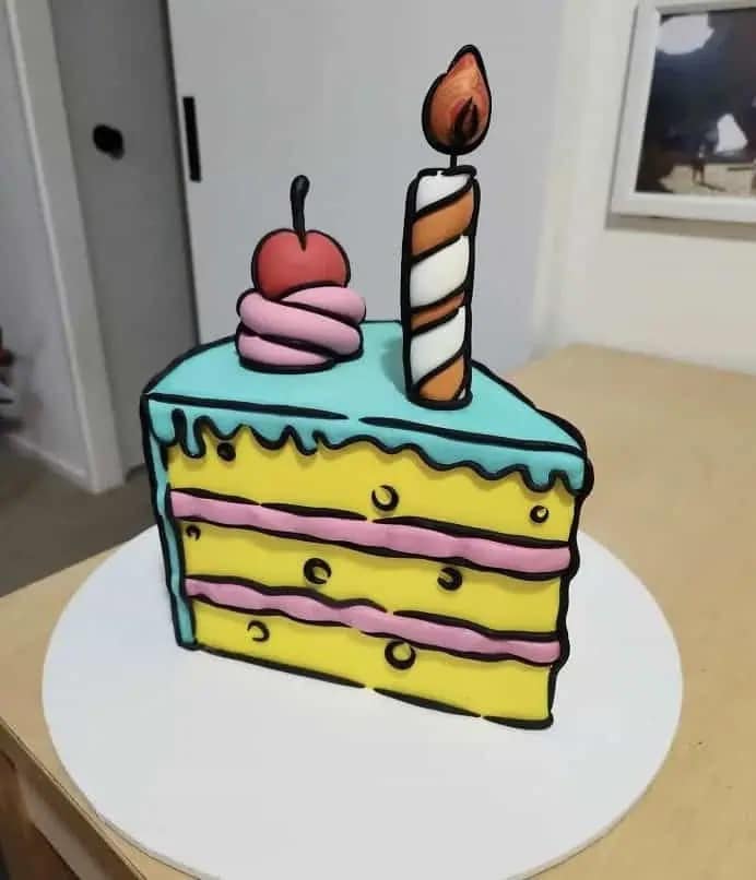A cool, trendy cake decorated with black icing to look like a 2D cartoon drawing.
