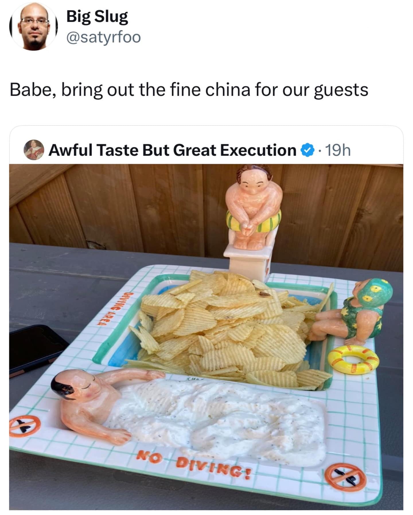 Funny chip and dip bowl shaped like a swimming pool with chubby figures.