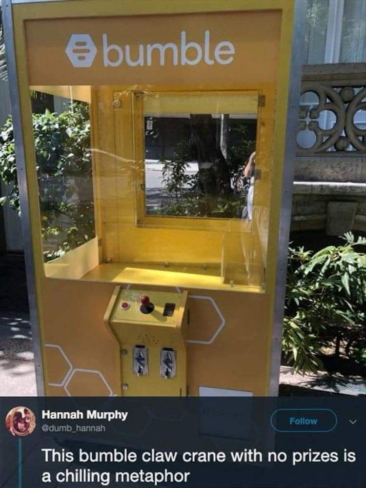 Funny dating meme of an empty Bumble claw machine, captioned "a chilling metaphor" for the app.