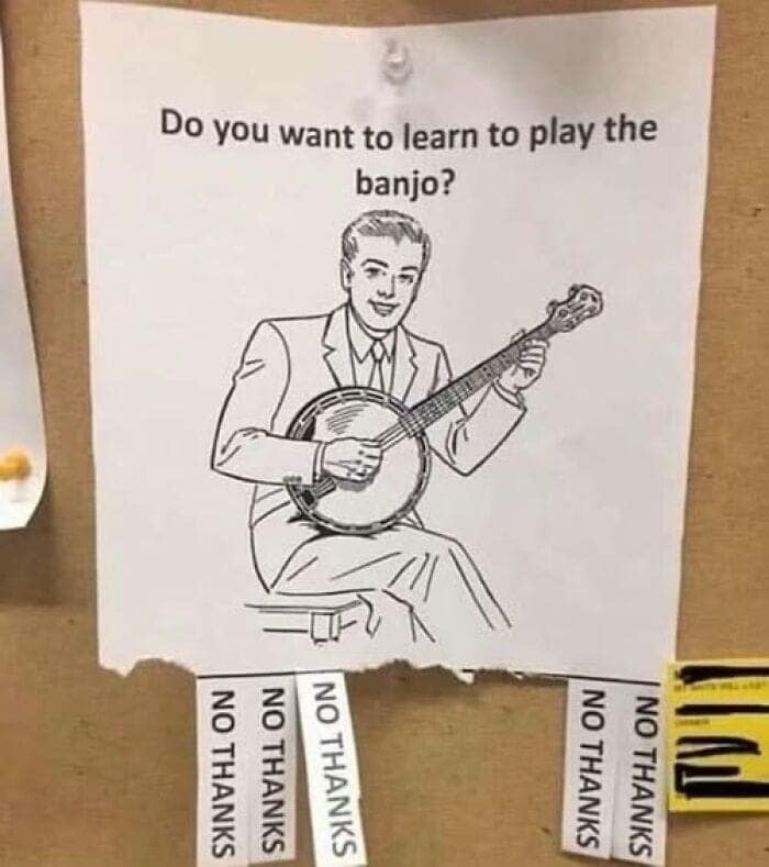 A funny sign for banjo lessons with all the pull-tabs at the bottom reading "NO THANKS."