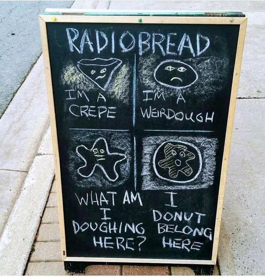 A chalkboard sign with "Radiobread" puns, like "I'm a crepe, I'm a weirdough."