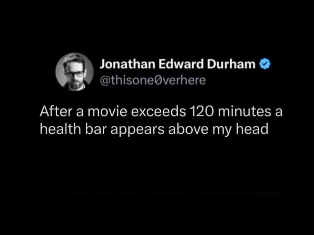 A funny meme from a viral tweet joking that a "health bar appears" over his head during movies longer than 120 minutes.