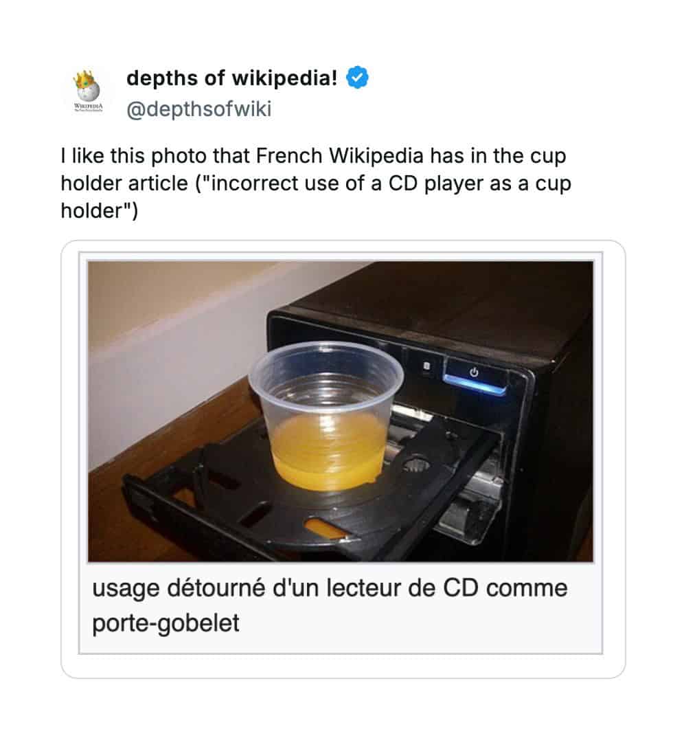 An unhinged Wikipedia entry for "cup holder" showing a CD player being used to hold a drink.