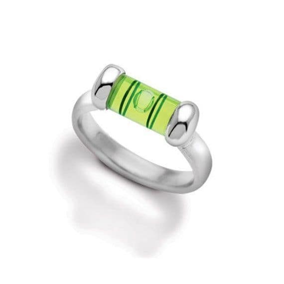 A creative silver ring for a builder or carpenter that features a functional, tiny green spirit level.