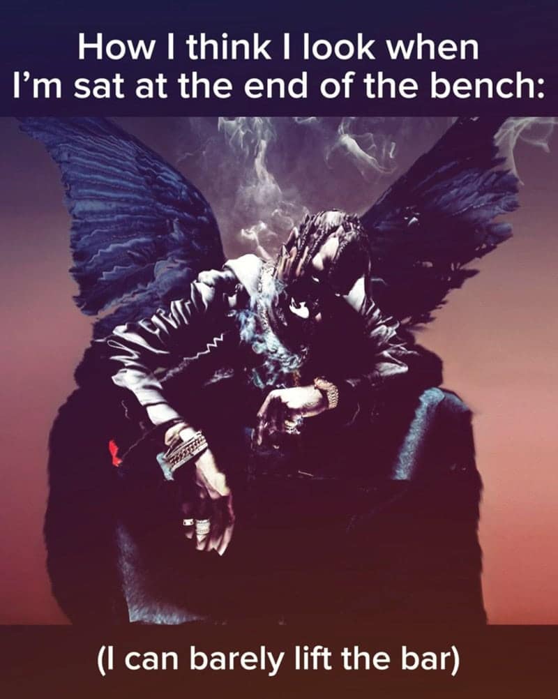 Workout meme showing Travis Scott sitting on a bench looking like a dark angel