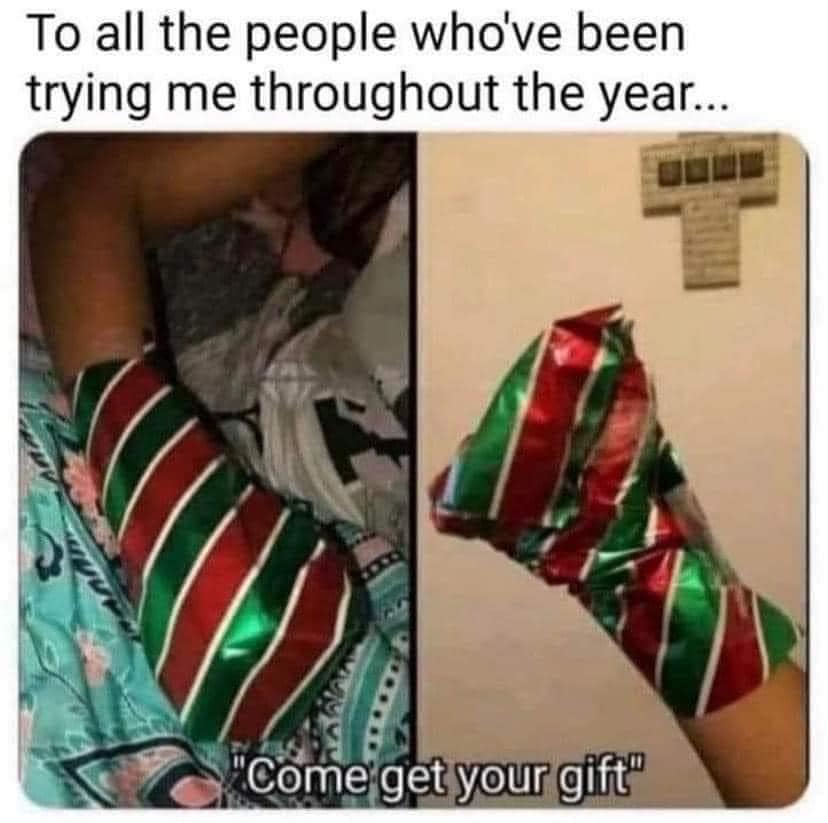 A classic meme of an arm in a cast wrapped in Christmas paper saying come get your gift.