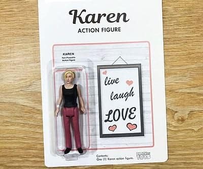 An unhinged toy action figure of a Karen with a Live Laugh Love sign.