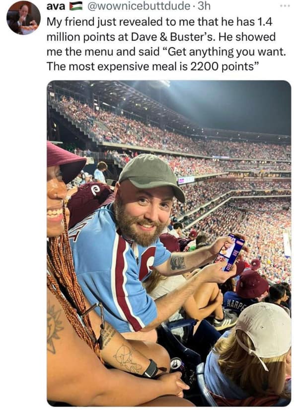 A wholesome meme tweet about a friend treating someone to a meal with Dave & Buster's points