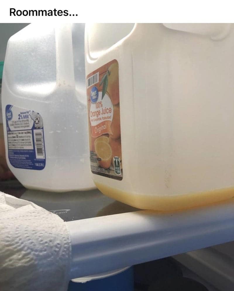 Nearly empty gallon of orange juice left in refrigerator with only a sip remaining.