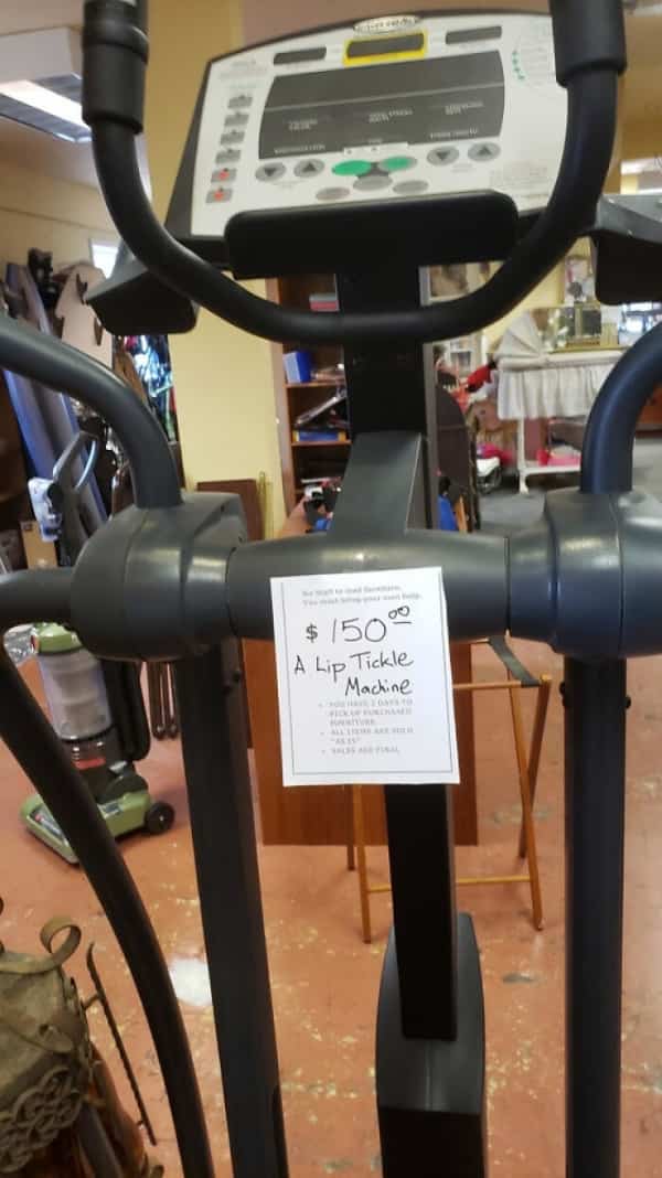 Price tag on an elliptical machine labeled as a Lip Tickle Machine.