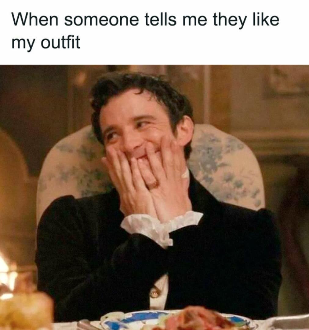 Benedict Bridgerton giggling behind his hands at a dinner table. A relatable Bridgerton meme capturing the pure joy of receiving an unexpected compliment on your outfit.