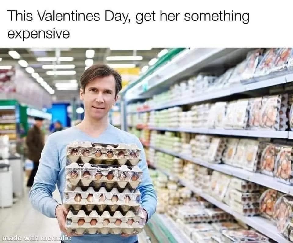 A satirical Valentines meme about inflation, suggesting that a man holding a massive stack of egg cartons is the ultimate flex for getting a partner "something expensive."