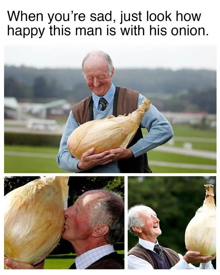 Elderly man smiling joyfully while hugging and kissing a massive world record sized prize onion.