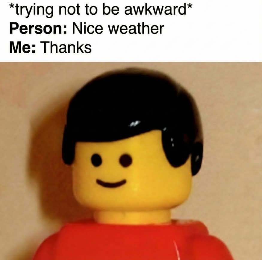 A socially anxious classic meme using a Lego figure with a simple smiley face to represent the awkwardness of accidentally saying "Thanks" when someone compliments the weather.