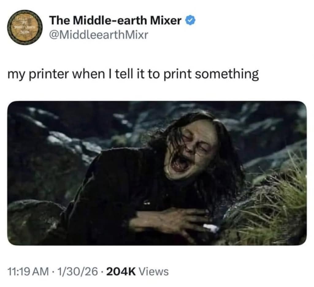 Gollum from Lord of the Rings violently coughing and struggling. Classic meme representing a printer trying to print a page.