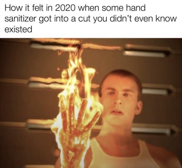 A highly relatable classic meme showing Chris Evans as the Human Torch staring at his hand completely engulfed in flames, perfectly describing the searing pain of 2020 hand sanitizer hitting a hidden papercut.