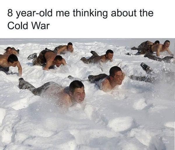 A literal interpretation old meme showing a squad of shirtless soldiers doing grueling military crawls through deep snow, perfectly representing how an 8-year-old pictures the "Cold War."