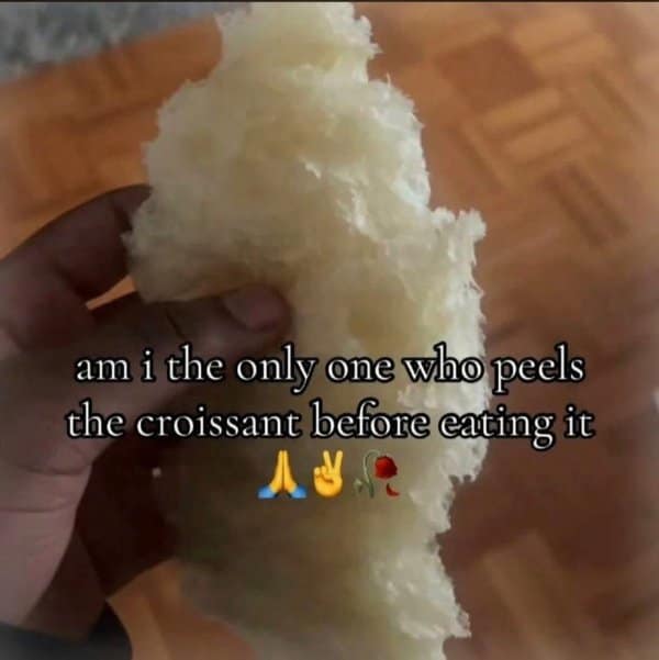 A food-based old meme asking if anyone else "peels the croissant" before eating it, showing the soft, fluffy interior of the pastry stripped of its crust.