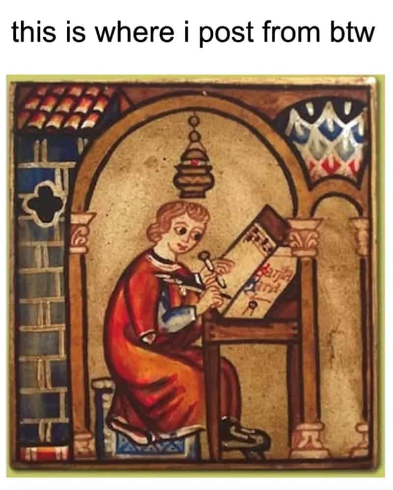 classical art meme: A medieval manuscript illustration of a person sitting at a small wooden desk writing with a quill. Text: "this is where i post from btw".
