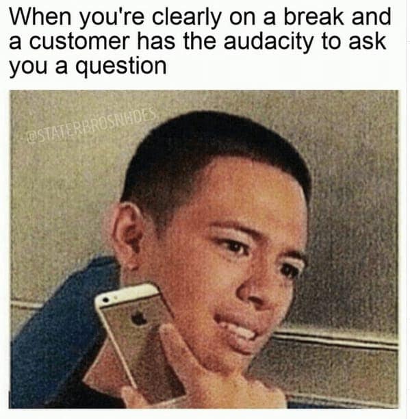 A highly relatable addition to customer service memes showing a guy holding his phone with a deeply disgusted expression, perfectly representing the sheer annoyance of being clearly on a break and a customer still having the audacity to approach you to ask a question.