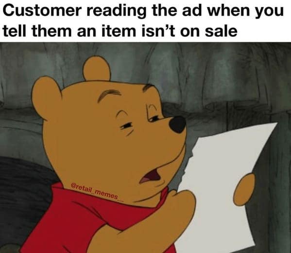 A classic Winnie the Pooh customer service meme showing the bear squinting intensely at a piece of paper, representing the exact look of pure, stubborn confusion a customer gives when they aggressively re-read a store ad after you tell them an item isn't on sale.