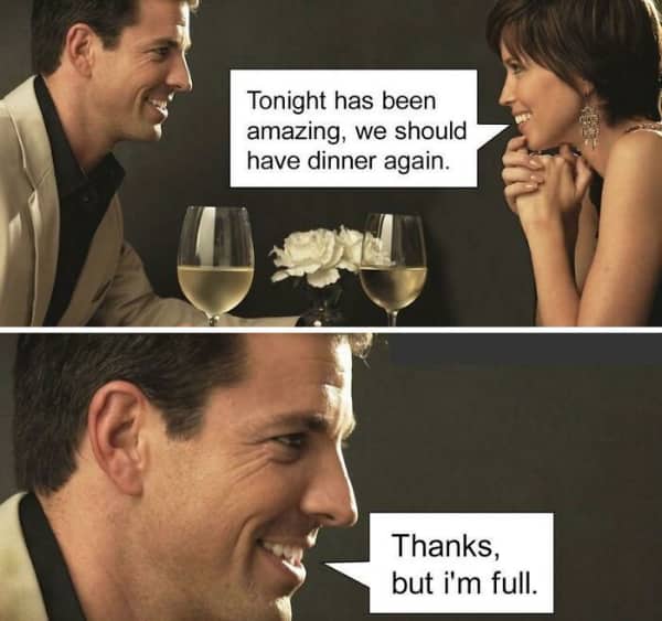 A man and woman on a romantic dinner date with white wine, sharing a pun about eating.