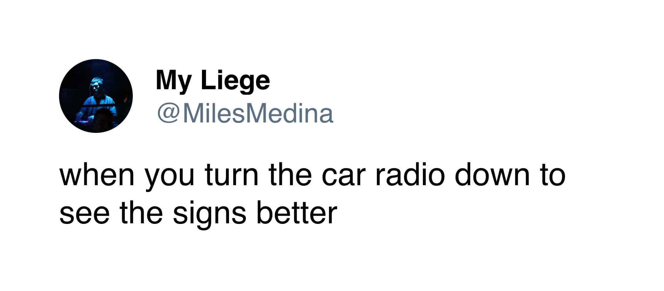 A highly relatable driving meme featuring a tweet that calls out the universal, illogical human instinct of having to completely "turn the car radio down to see the signs better" while lost on the road.