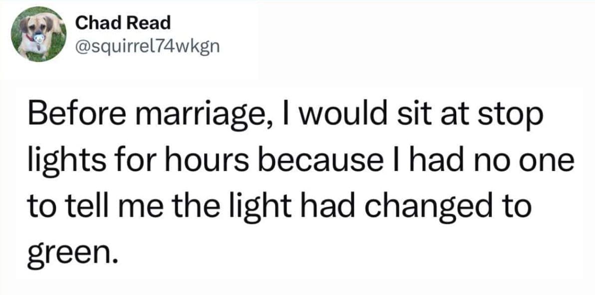 A hilarious marriage-themed driving meme featuring a tweet where a husband jokes that before getting married, he would sit at stop lights for hours because he didn't have a spouse in the passenger seat to instantly alert him the exact second the light turned green.