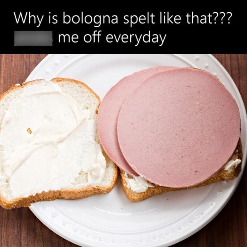 A food meme questioning the confusing spelling of "bologna" while showing a simple sandwich on a white plate.