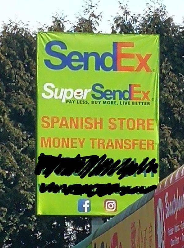 Bright green billboard for a Spanish store called SendEx copying the famous FedEx logo typography for money transfers.