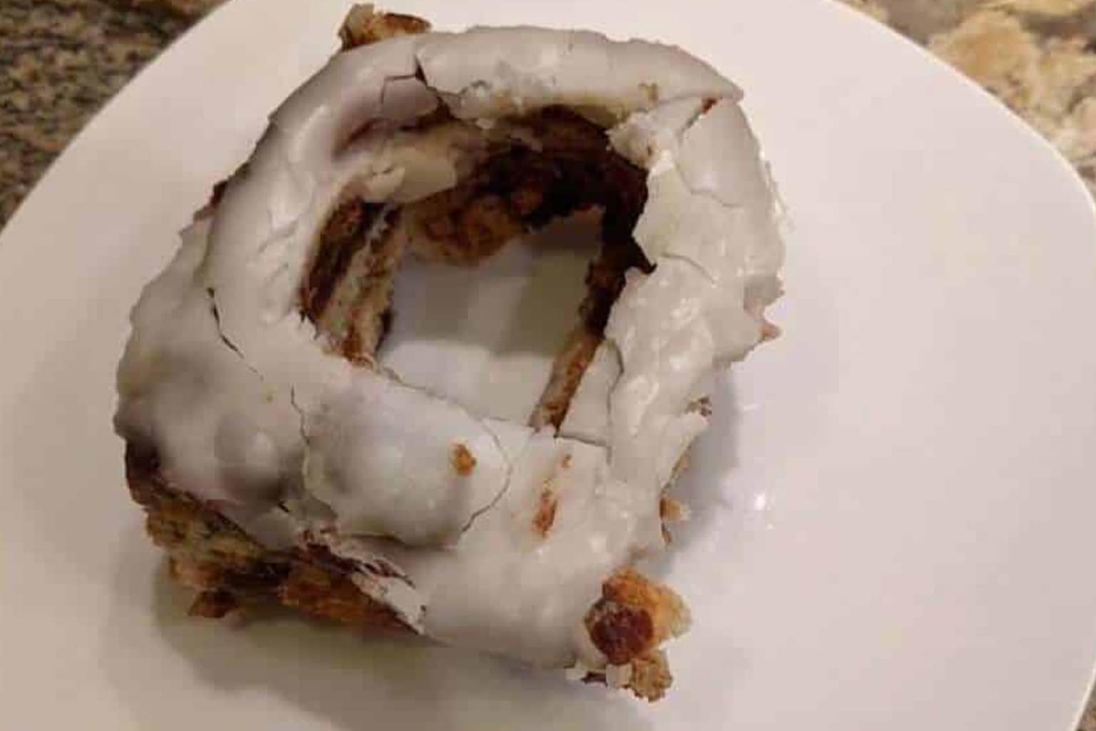 Funny marriage meme compilation: A collage featuring a husband comparing carrying his wife out of Costco to an Olympic figure skating lift, a hollowed-out cinnamon roll representing an unforgivable culinary betrayal, and a disastrous kid's lunchbox filled with pizza slices completely covered in shattered glass.