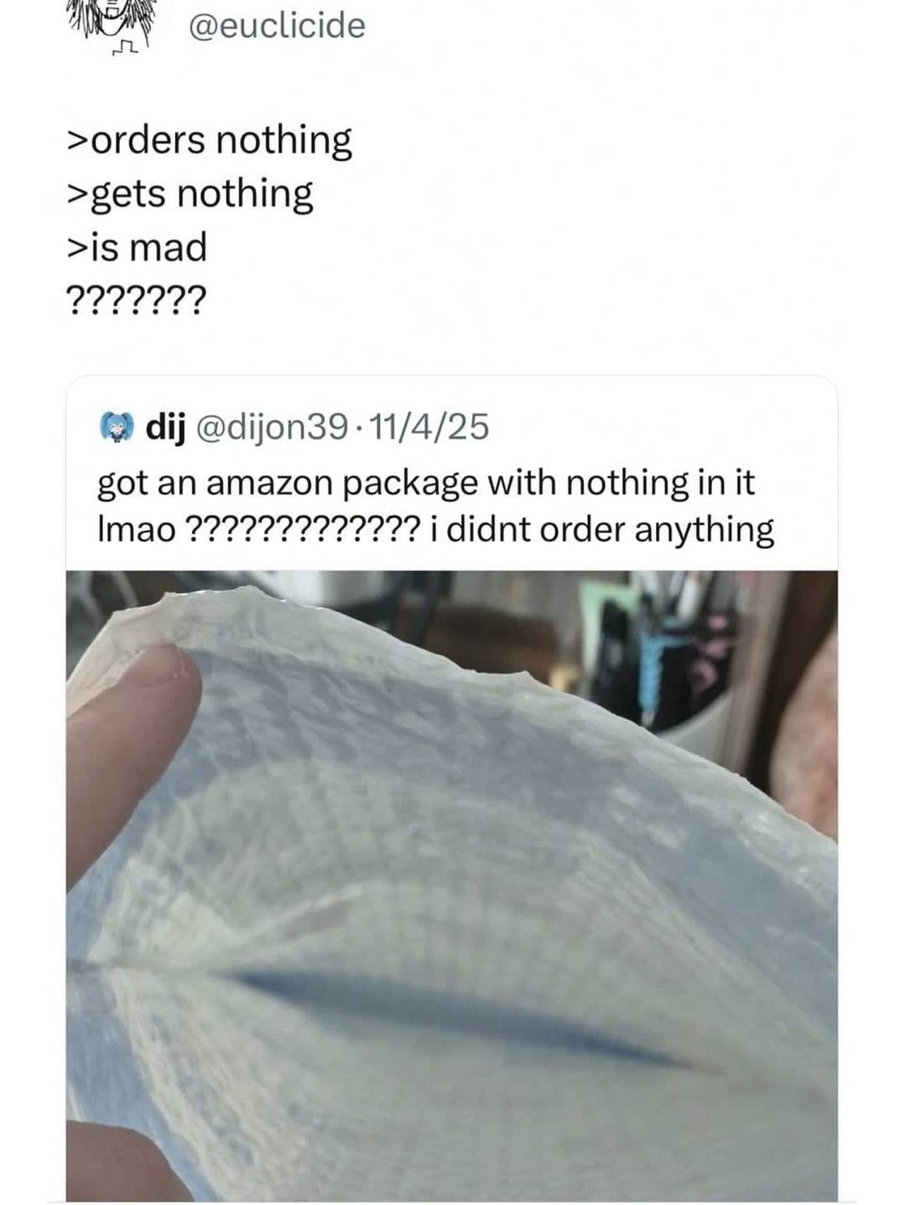 Confusing Amazon delivery meme showing an empty padded mailer received when nothing was ordered.