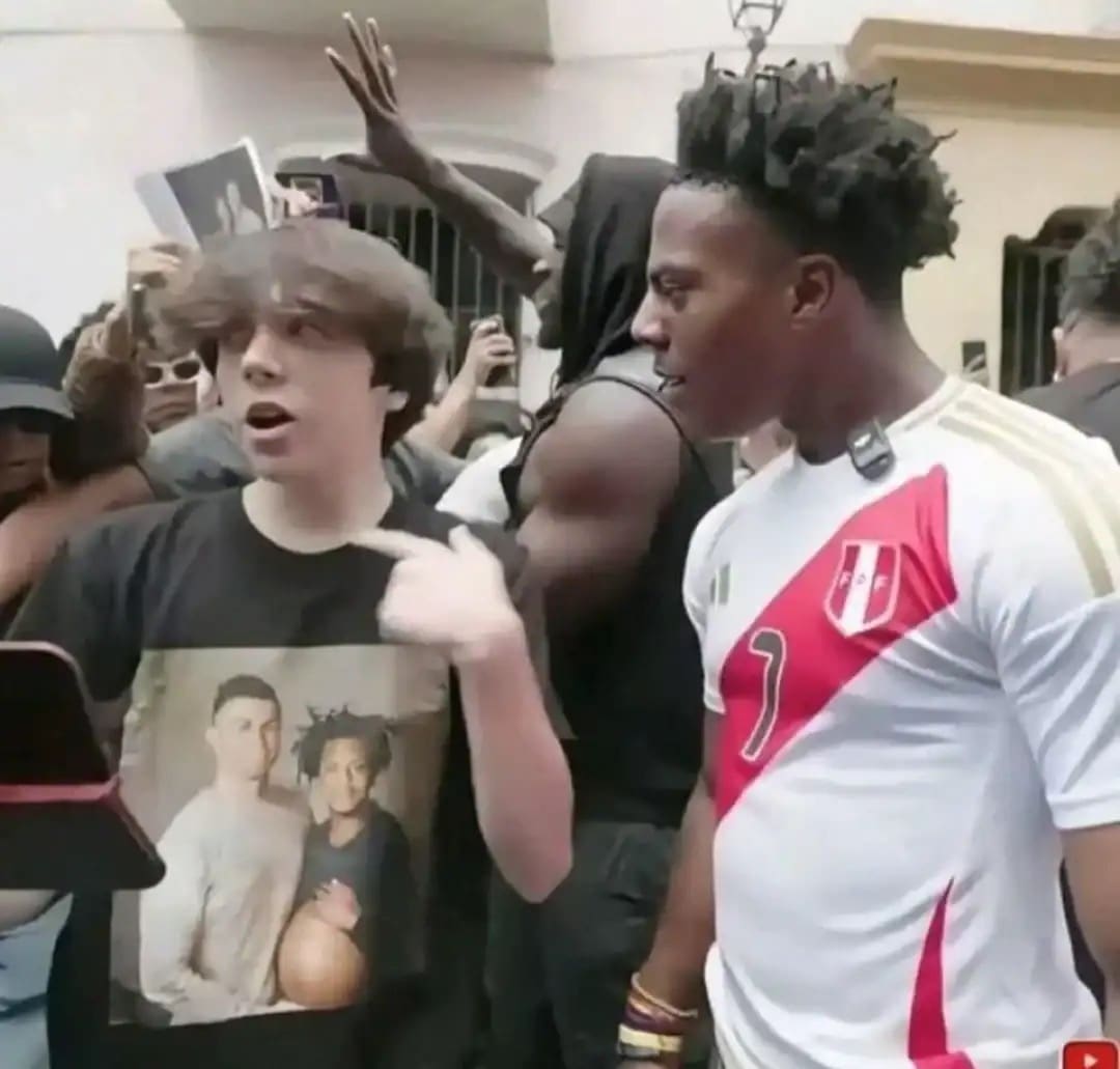 Fan showing streamer IShowSpeed a shirt featuring a photoshopped image of him pregnant with Ronaldo.