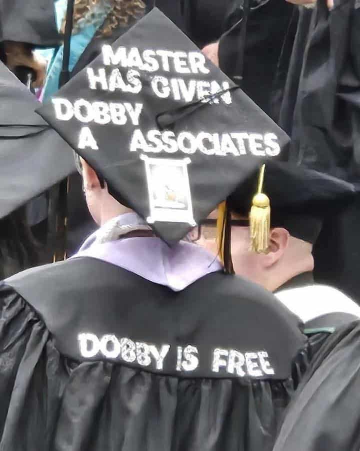 Graduation cap and gown decorated with Dobby is free quotes. Clever harry potter meme celebrating a new college degree.
