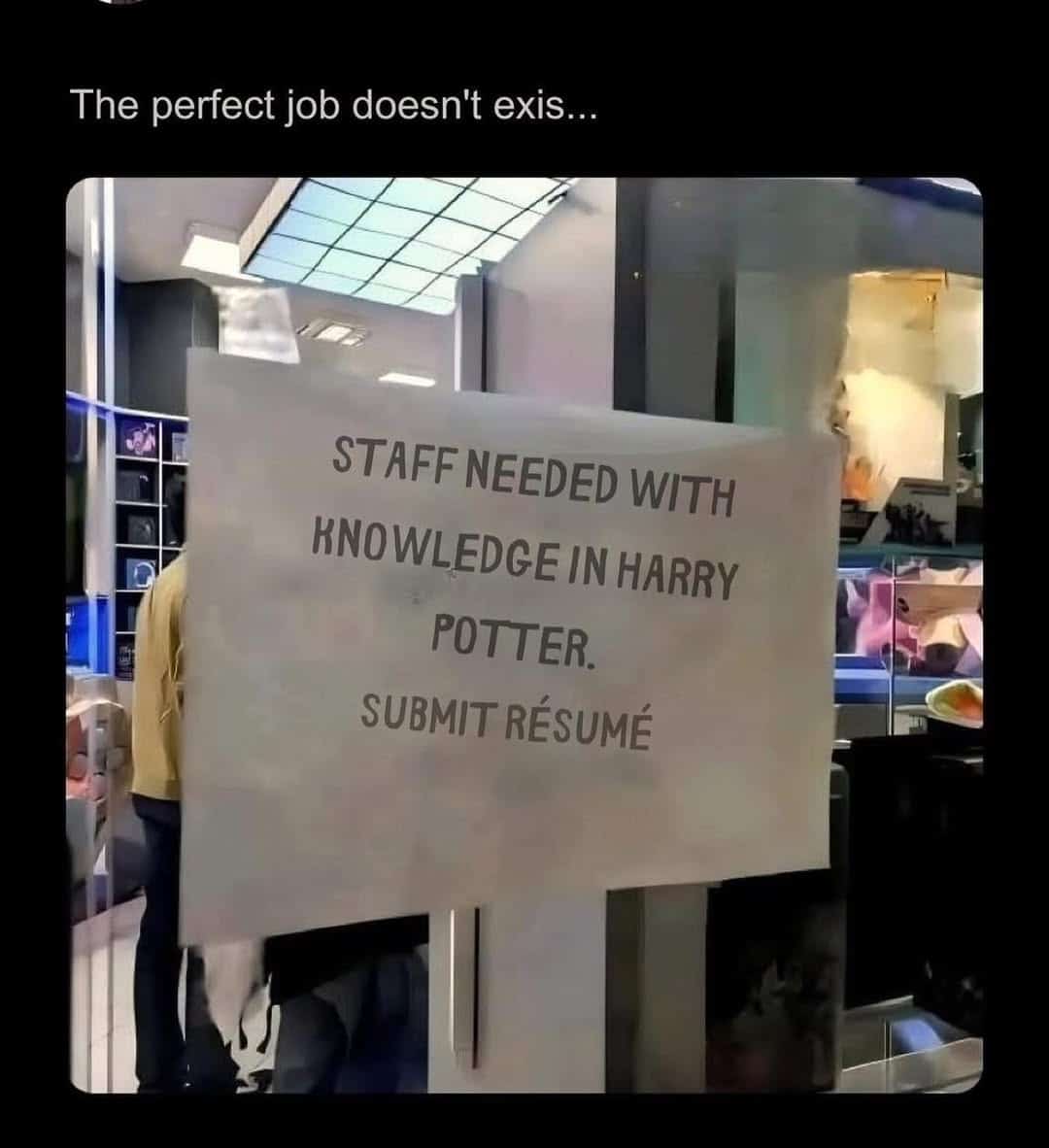Store hiring sign specifically requesting wizarding knowledge. The ultimate dream job for a dedicated fantasy fan.