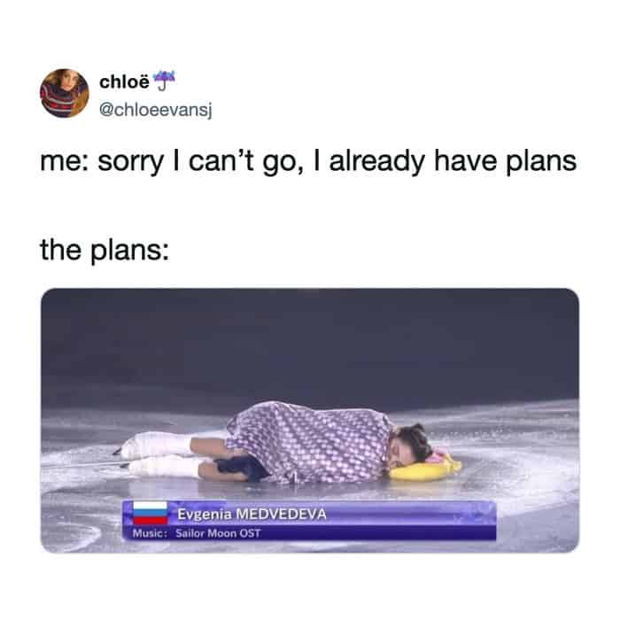 A highly relatable social anxiety meme showing an Olympic figure skater lying completely face-down on the ice wrapped in a blanket, serving as the perfect visual for "me: sorry I can't go, I already have plans".