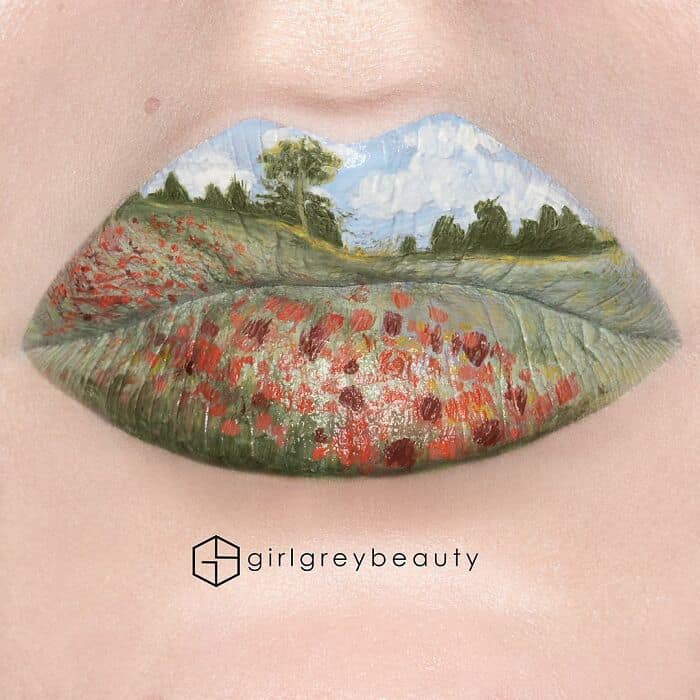 A breathtaking impressionist painting rendered as amazing lip art, depicting a lush green field of red poppies under a cloudy sky, proving the canvas-like quality of Andrea Reed lip art.