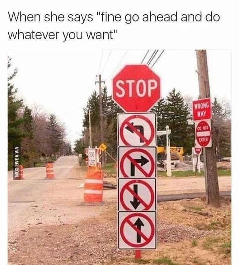 A confusing marriage meme displaying a traffic pole with "Stop" and "No Entry" signs in every direction to illustrate the trap of a wife saying "do whatever you want."