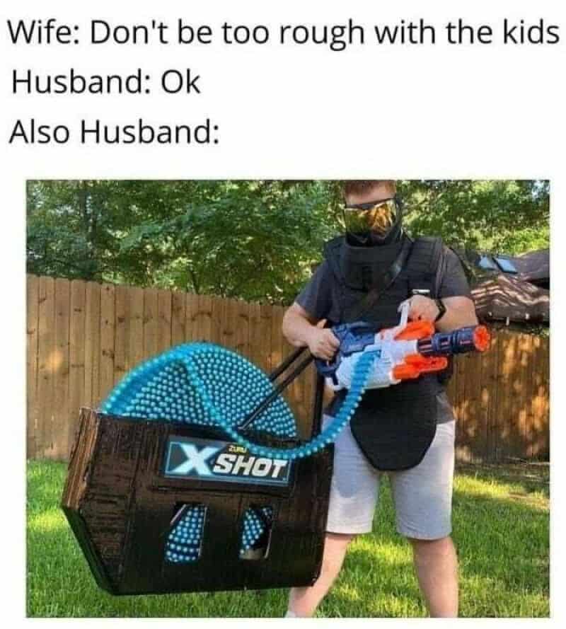 A marriage meme showing a dad fully geared up with a massive toy minigun, ready to obliterate the kids in a Nerf war despite the wife's warning to "not be too rough."