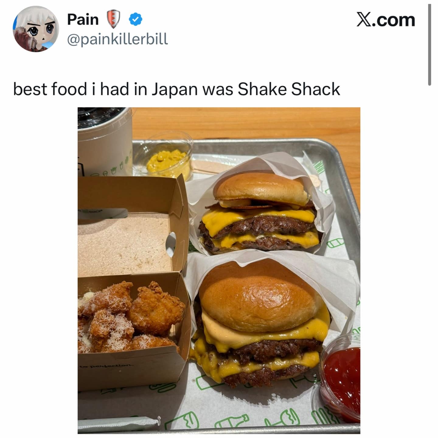 A meme dump tweet featuring a delicious-looking tray of Shake Shack burgers and fries, ironically captioned as the "best food i had in Japan."