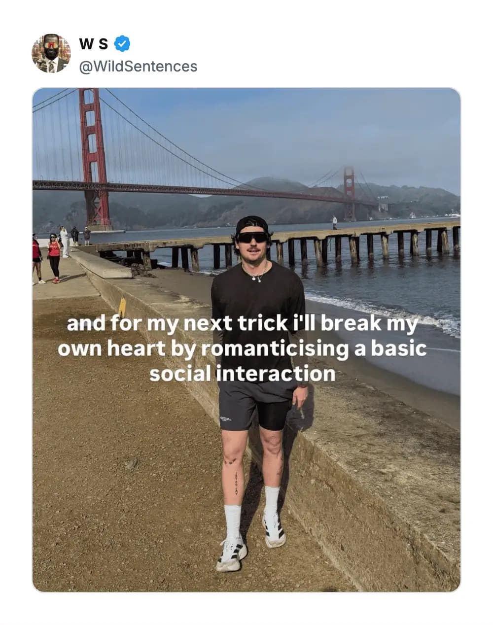 A hilarious meme photo of a man standing by the Golden Gate Bridge, captioned with a self-sabotaging plan to break his own heart by romanticizing a basic social interaction.