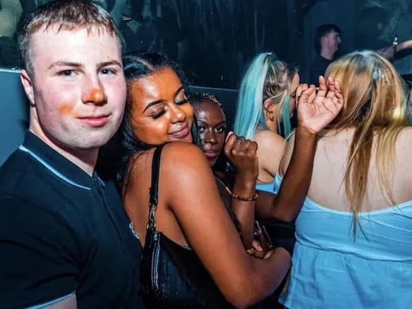 A perfect visual story and one of the best hilarious memes in the batch, capturing a guy at a nightclub with a blatant, orange smear of foundation makeup directly on his nose from the girl dancing next to him.