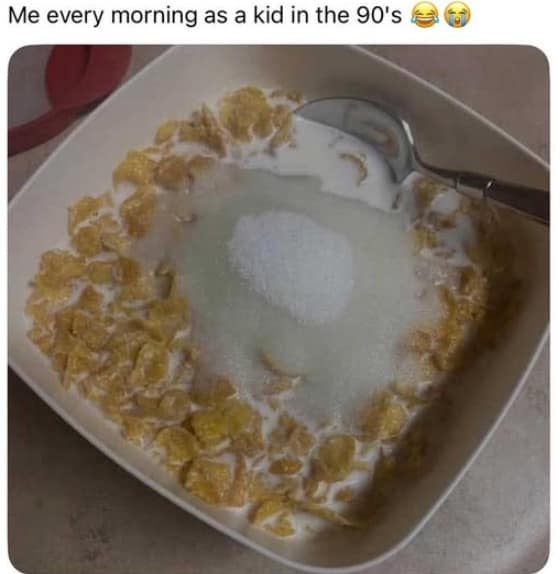 Bowl of cereal buried under a massive pile of sugar. Relatable internet memes about unhealthy 90s childhood breakfasts.