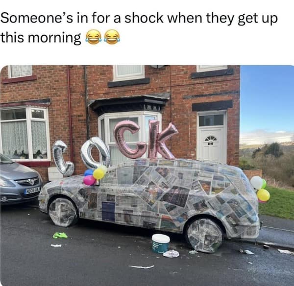 A dedicated prank funny meme showing a car completely wrapped in newspaper and topped with balloons spelling out a crude word, captioned "Someone's in for a shock."
