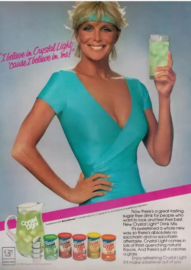 A retro advertisement for Crystal Light featuring actress Linda Evans in workout gear promoting the sugar-free nostalgic drink mix.