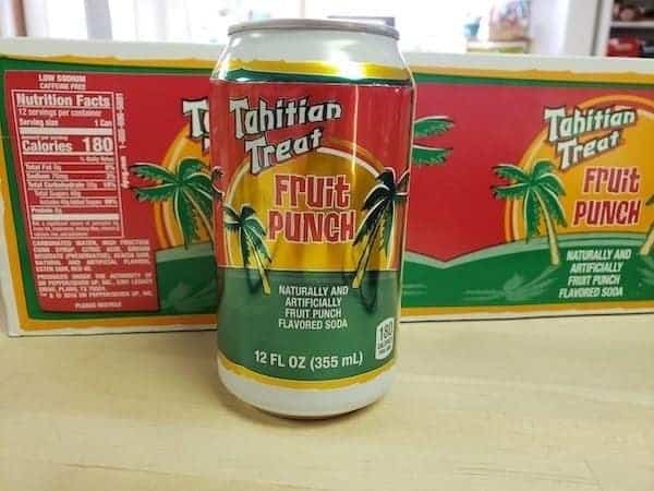 A can of Tahitian Treat Fruit Punch soda, a carbonated nostalgic drink known for its intensely sweet tropical flavor.