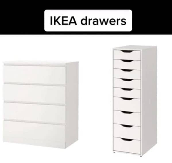 wo pieces of white IKEA furniture, including a four-drawer dresser and a tall ten-drawer unit.