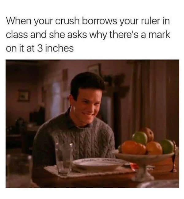 James Hurley smiling creepily at a dinner table. Funny reaction picture about a crush finding a small mark on a ruler.