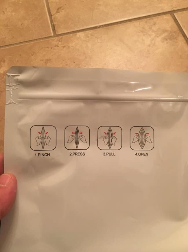 A very accidentally nsfw set of opening instructions on a plastic pouch, featuring four steps—pinch, press, pull, open—that combine with an unfortunate design to look exactly like a medical diagram for female anatomy.