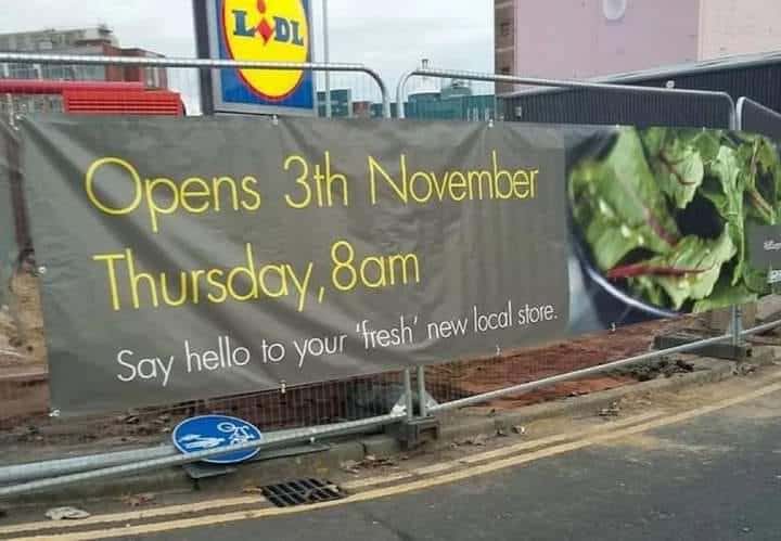 Banner for a new local store describing its products as fresh in quotation marks.